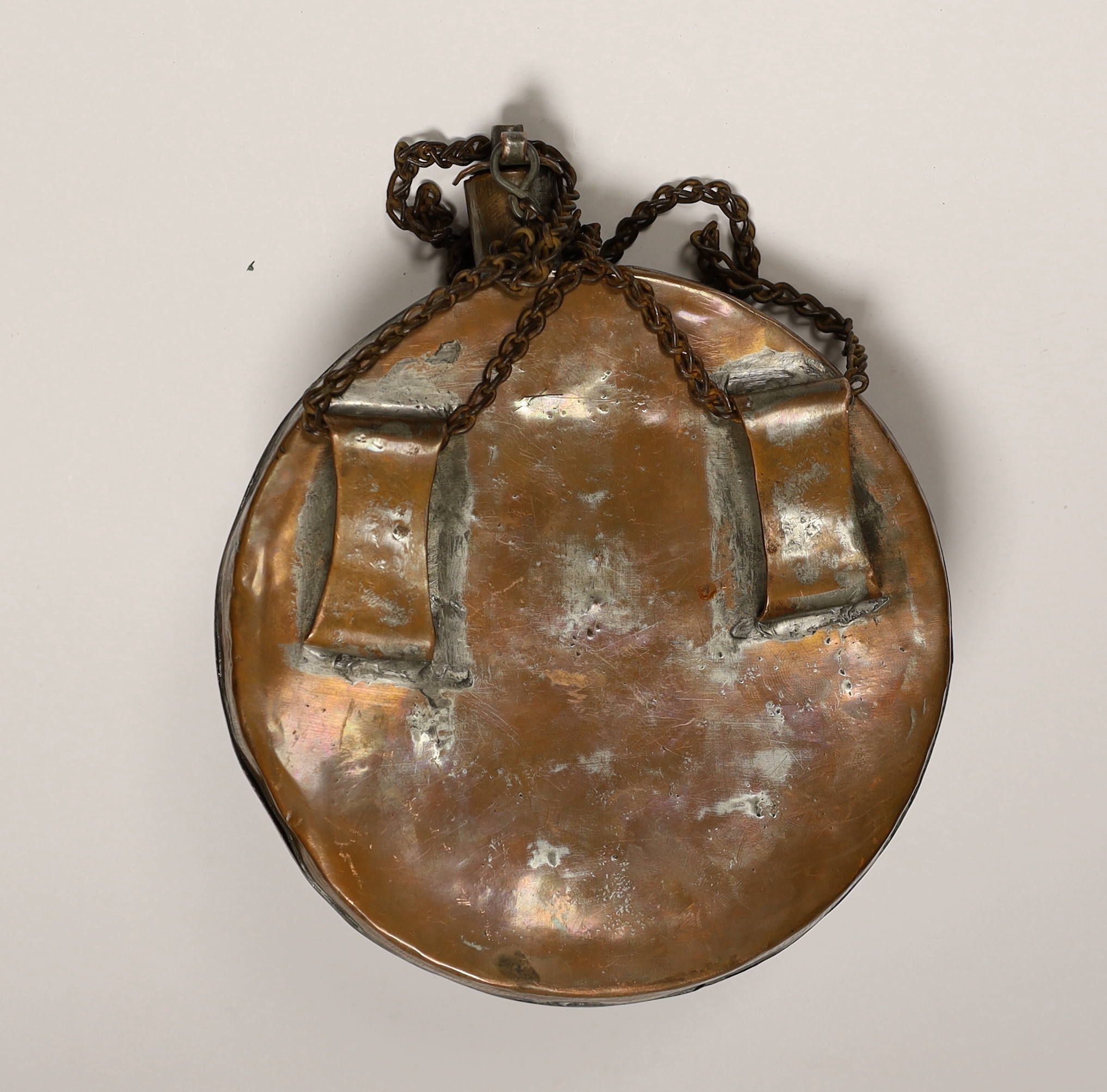 An Ottoman Empire copper water flask with incised decoration, 21cm high